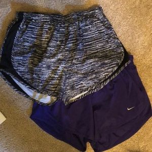 Two pairs of Nike classic running shorts